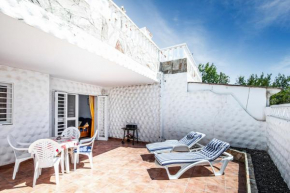 Near the beach with huge terrace, parking and wifi